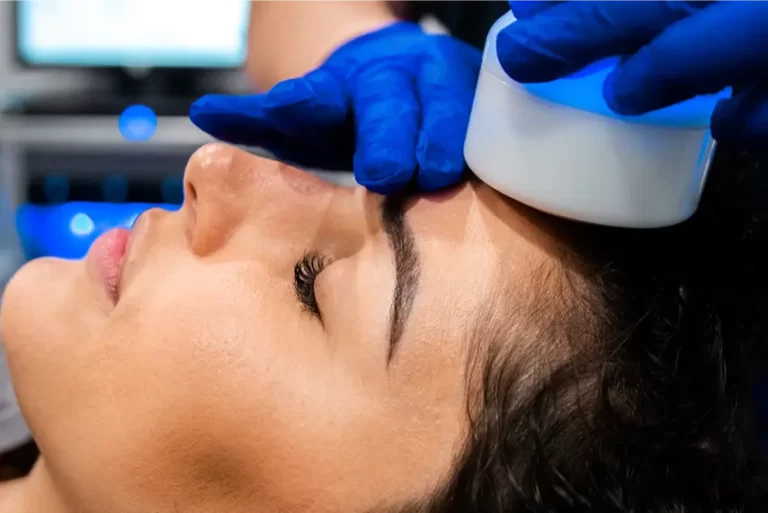 a close up of a woman during a treatment.