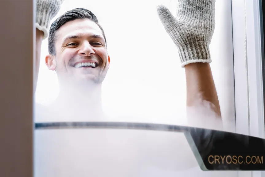 a man with gloves waving in a cryochamber.